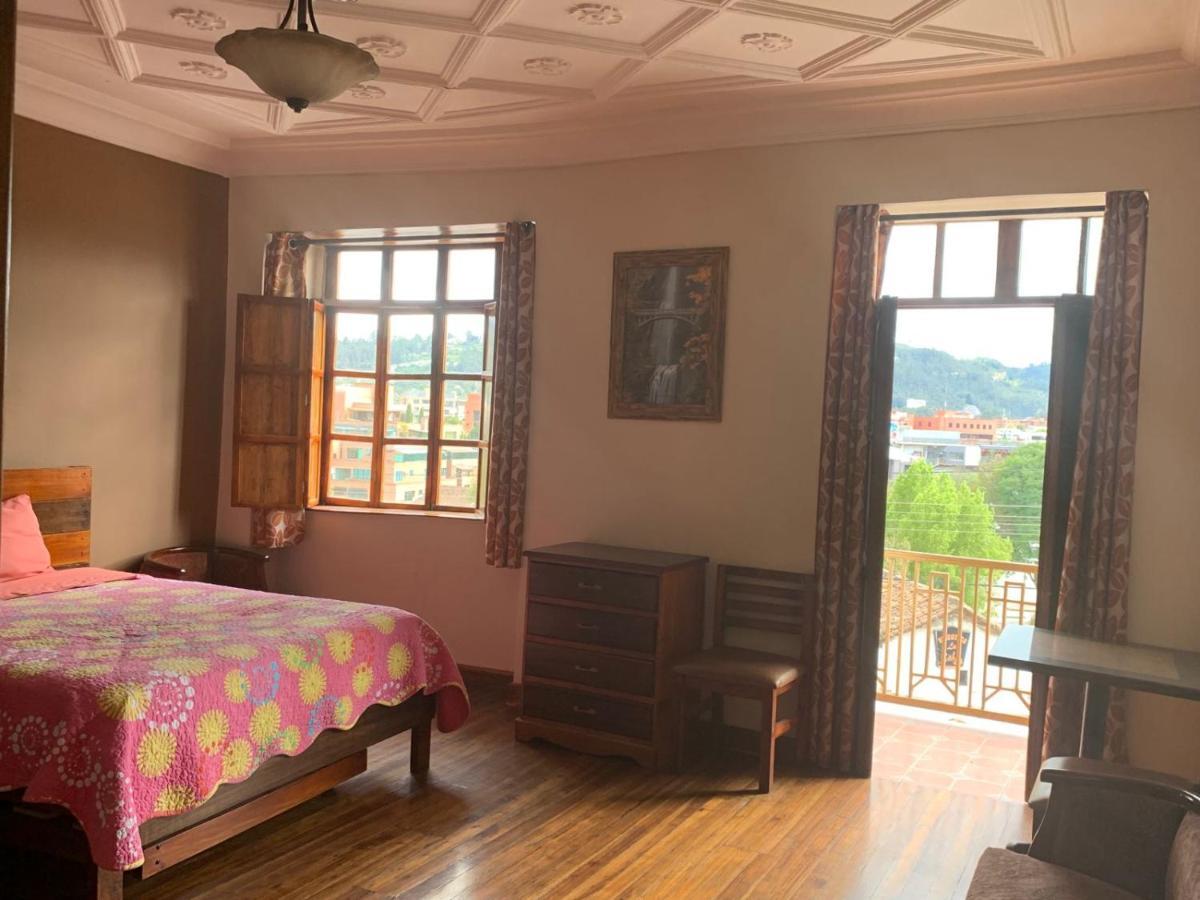 Hostel Santa Canela 昆卡 外观 照片